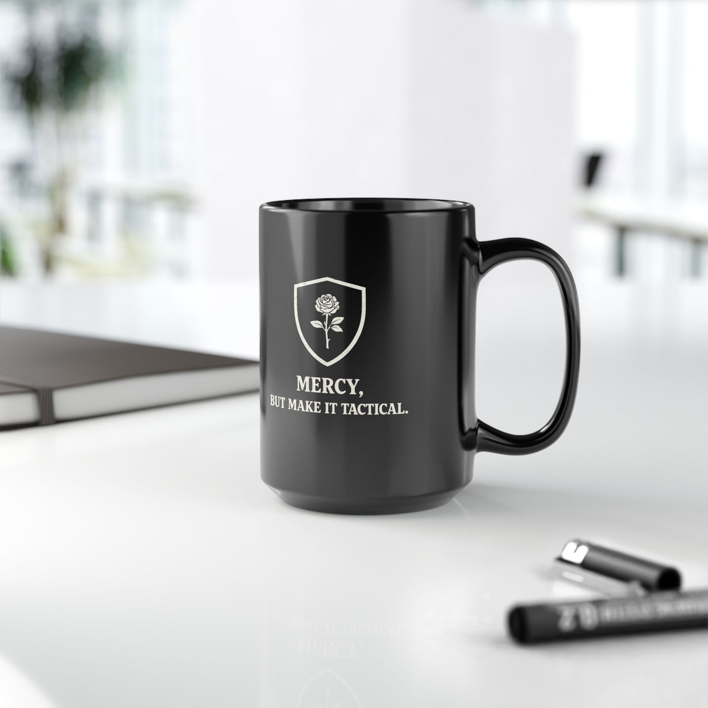 Mercy But Make It Tactical Mug — Black Coffee Cup with Rose Shield Graphic (11oz/15oz)